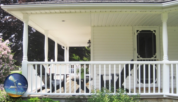 Spacious wrap around porch/deck refinished in sparkling clean white for this home