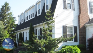 Historial Status Home in Niagara-On-The-Lake Gets Classic Exterior White/Black Refinishing