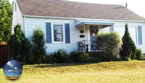 Homeowner goes for clean, white exterior finish, no more dark and dreary
